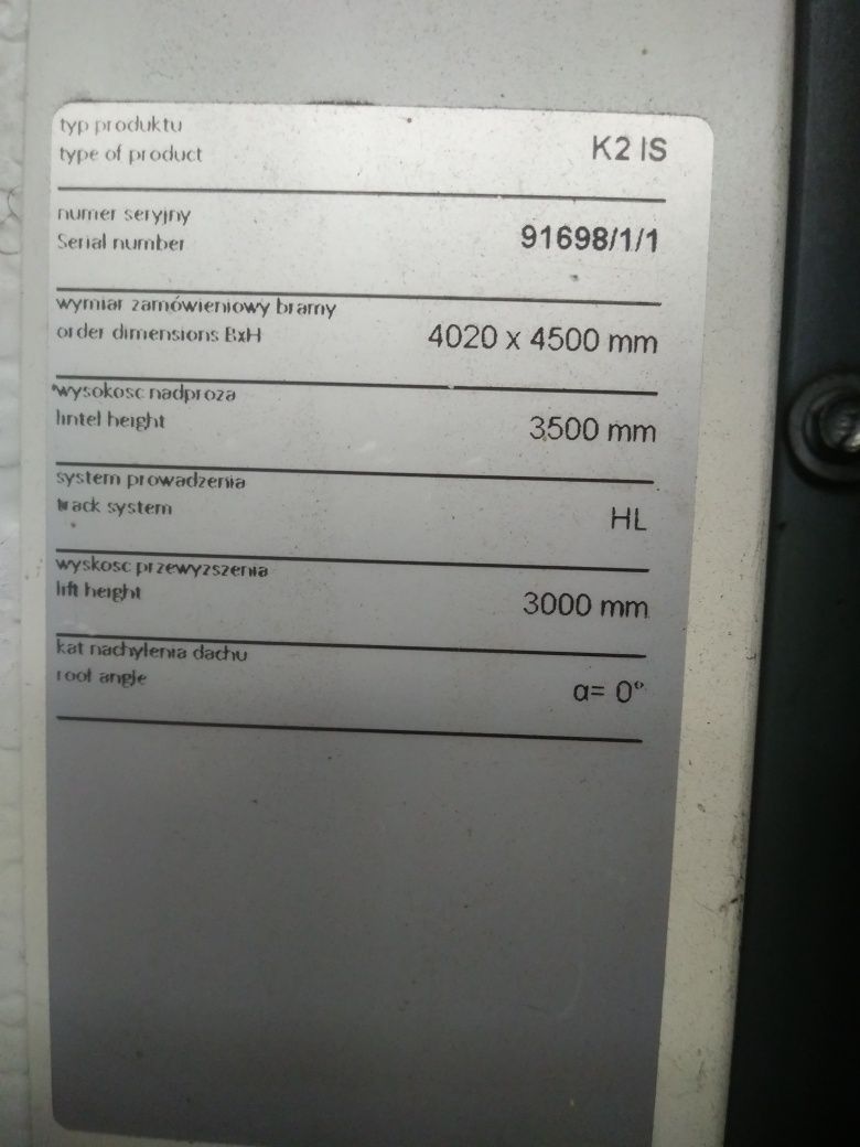 Brama garażowa segmentowa Krispol 402x450 koloru wiśniowego