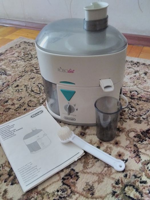 Соковитискач (соковыжималка )DeLonghi