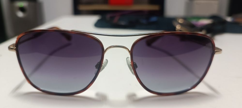 Óculos Polaroid e Web