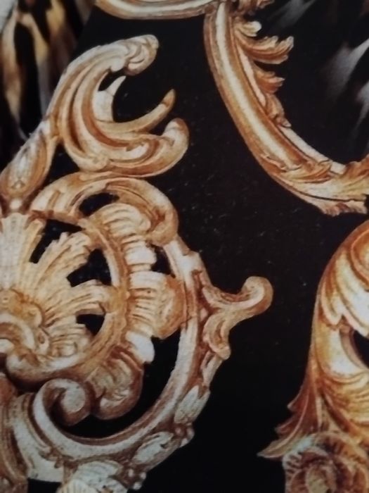 Krótka sukienka długi rękaw ornamenty panterka łańcuchy roz. ok. S