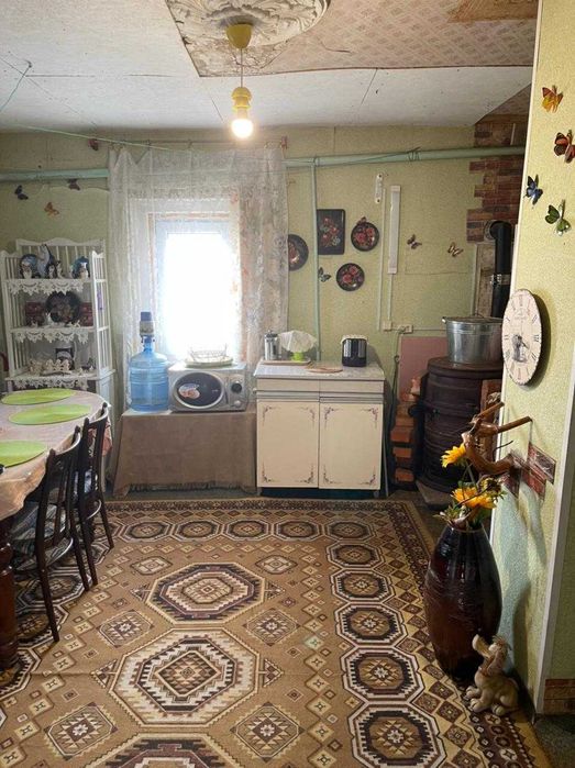 Ділянка з дачним будинком 25 соток  Комарівка Ліс