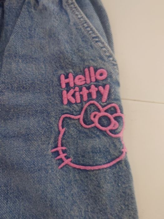 Śliczne spodnie dżinsowe Hello Kity, H&M, r.134