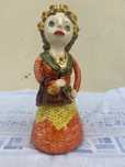 Boneca em barro nova