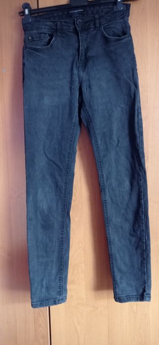 Jeansy czarne spodnie jeansowe Reserved 32/34