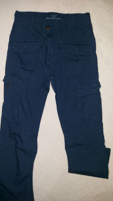 Calças NOVAS H&M 6/7anos  com bolsos laterais - Novas