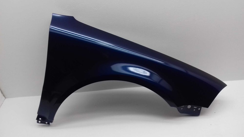 Błotnik lewy VW PASSAT B5 LIFT bez otworu na kierunek WSZYSTKIE kolory