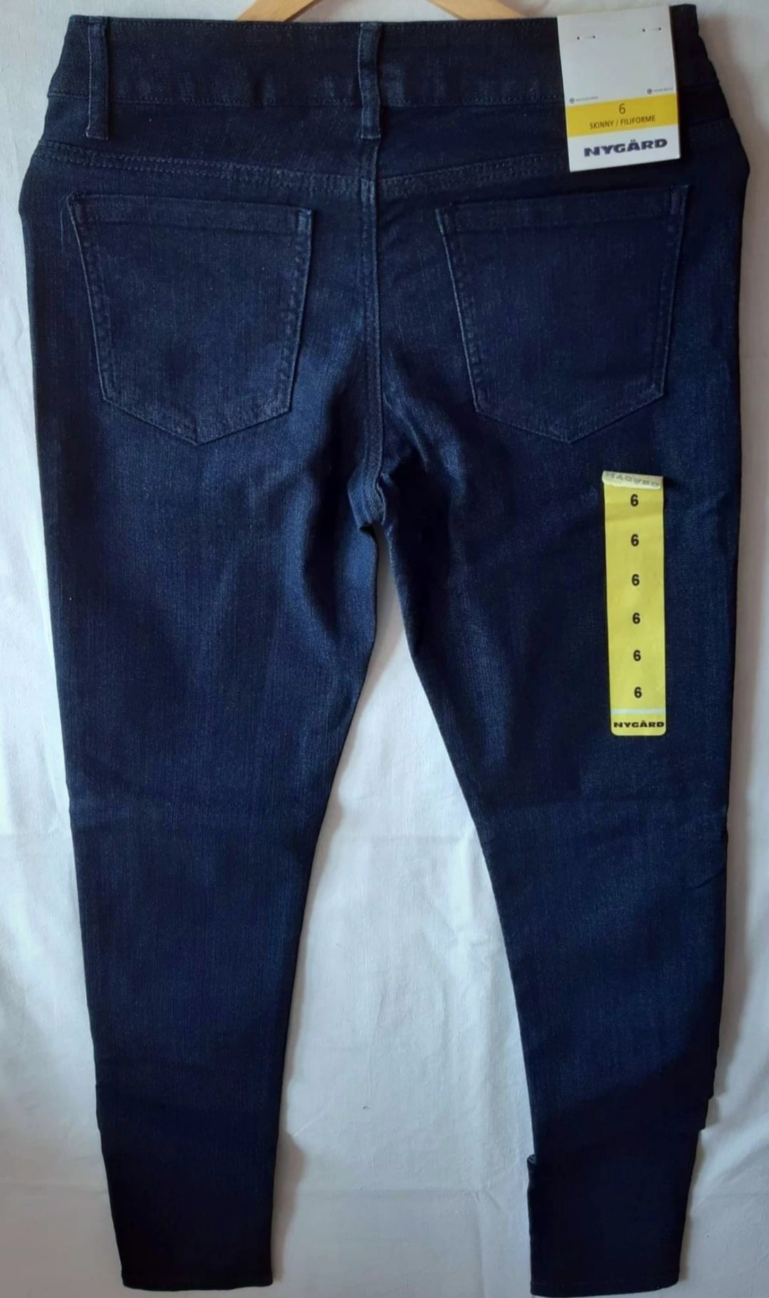 Ciemne jeansowe spodnie w rozmiarze XS (34)