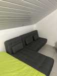 Sofá-cama moderno cinzento escuro