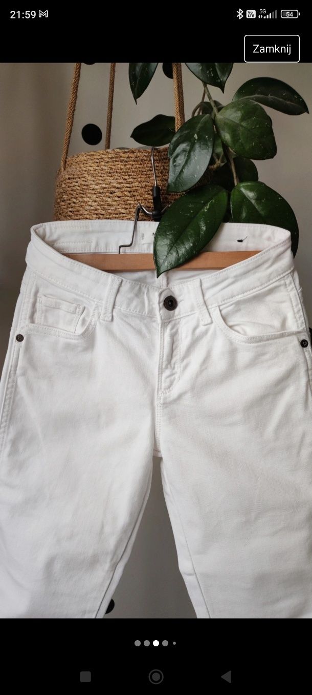 Białe spodnie jeansowe rurki skinny wysoki stan