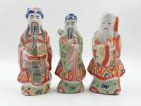Trzy stare figurki pokolenie Chińczyków pradziadek dziadek ojciec wnuk