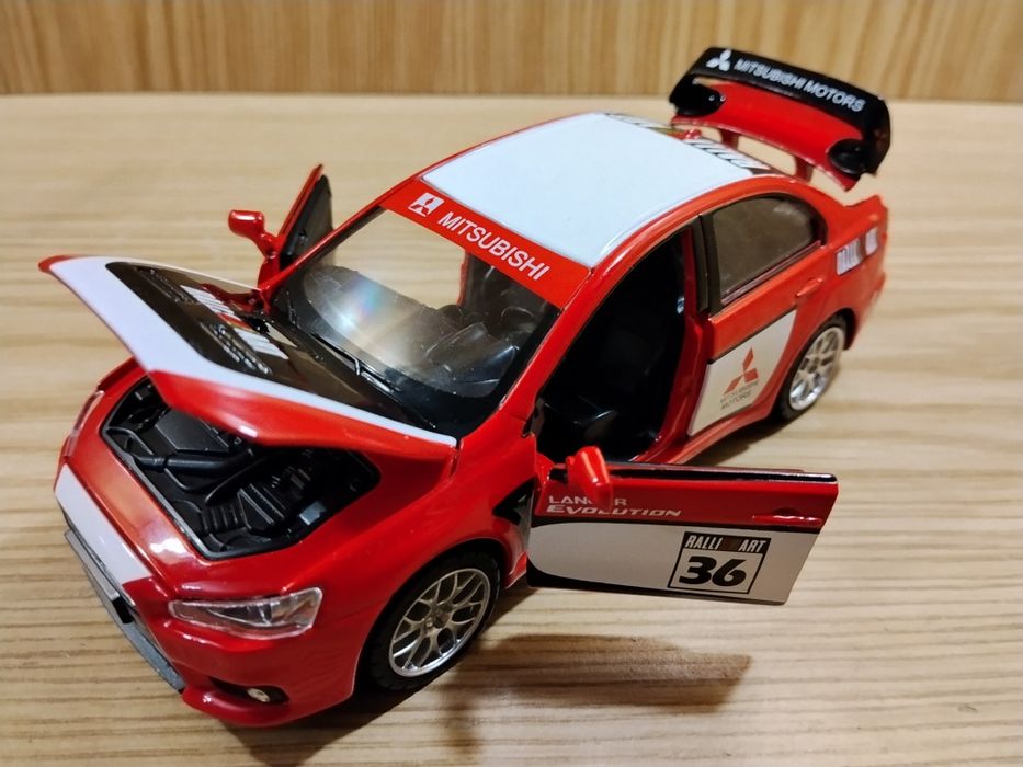 Модель mitsubishi lancer x evolution 1:32 Автопром металл свет звук ин