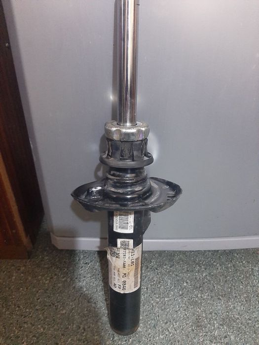 Передня ліва стійка амортизатора (б/в) для Volkswagen Tiguan 2014