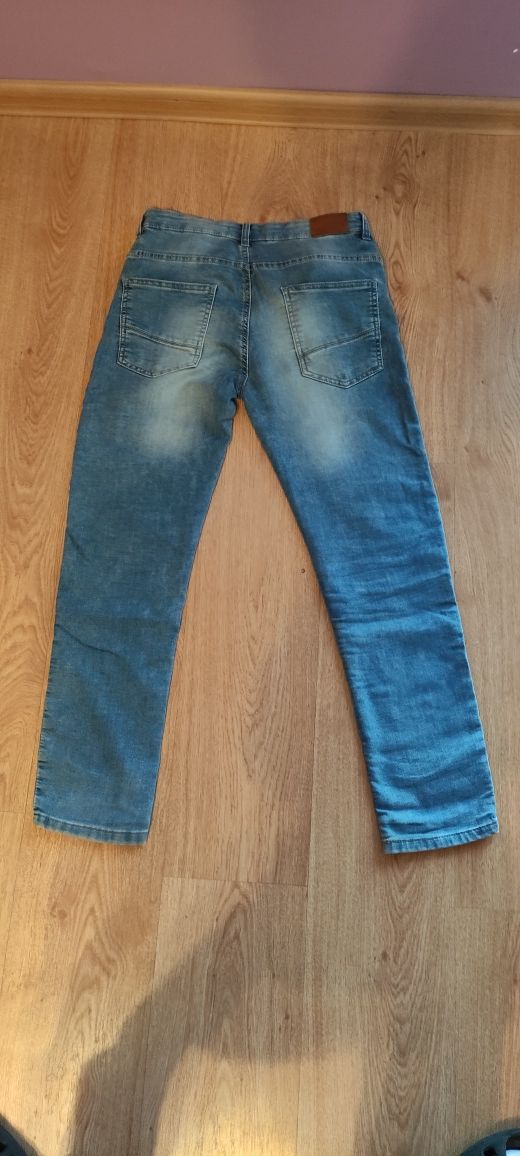 Spodnie dżinsowe chłopięce rozmiar 164 firmy Reserved