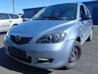 lampa przód przednia prawa lewa  Mazda  DY 02- Części