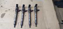 Wtrysk wtryskiwacz paliwa VW passat B7 1.6 TDI 03L130277B