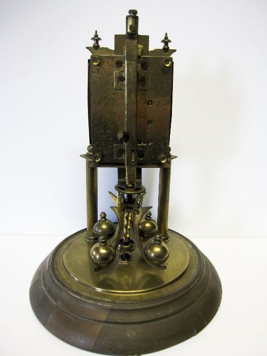 antigo Relógio anual de pêndulo rotativo com redoma em vidro