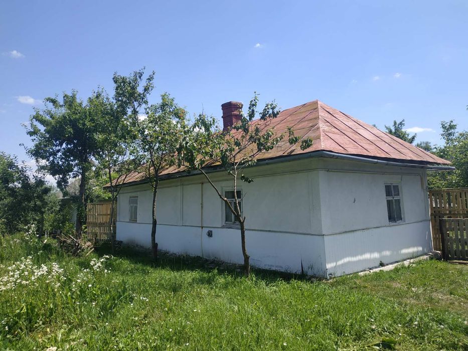 Ділянка з будинком