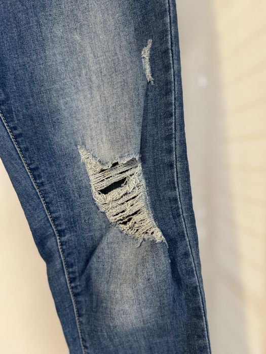Jeansy damskie z rozdarciami rozmiar L