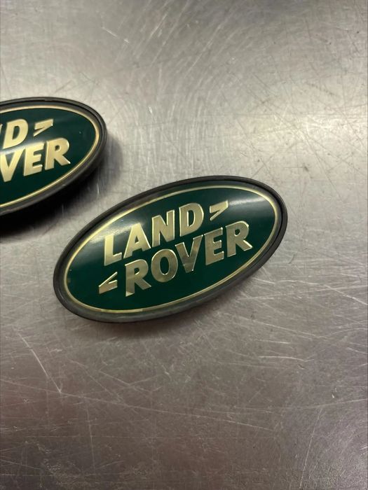 Land Rover DISCOVERY Logo puxador porta mala FVH100110 emblema