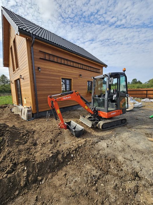 Usługi minikoparką lub wynajem bez operatora minikoparka brukarstwo