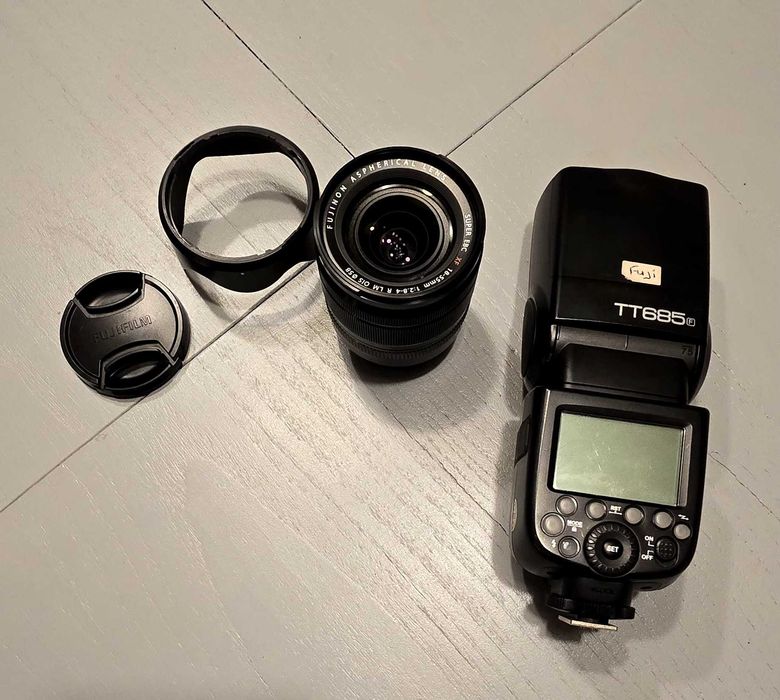 Lente Fuji como nova e flash