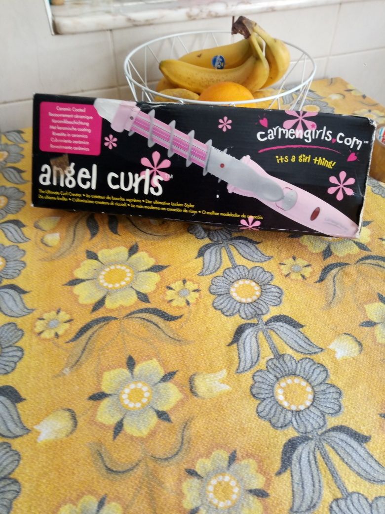 Ferro de encarrocolar o cabelo
