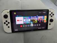 Nintendo Switch Oled + akcesoria + karta pamięci + gry