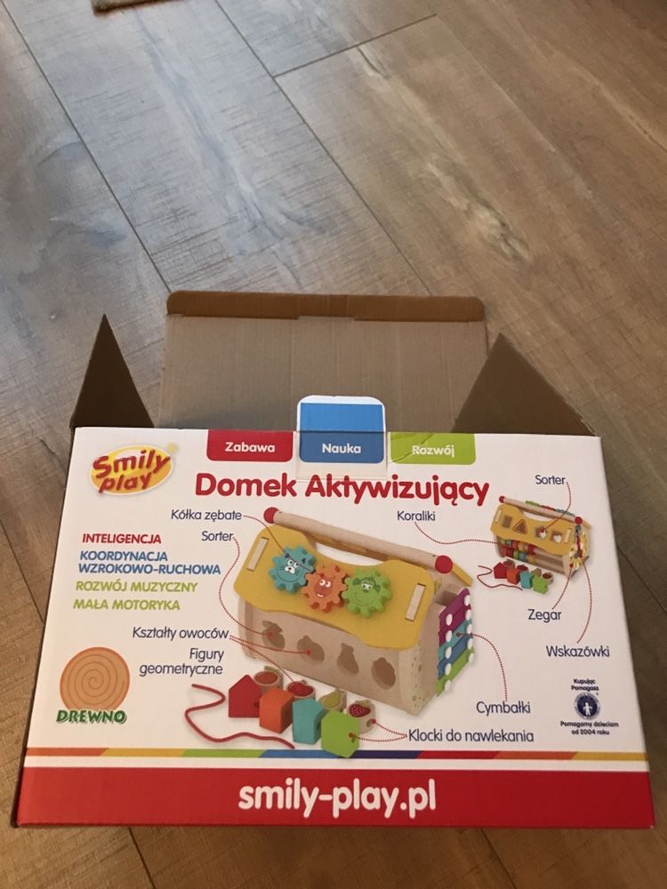 Domek aktywizujący Smily play, sorter, zegar, cymbałki, koła zębate