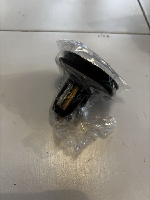 Czarny korek do umywalki klik