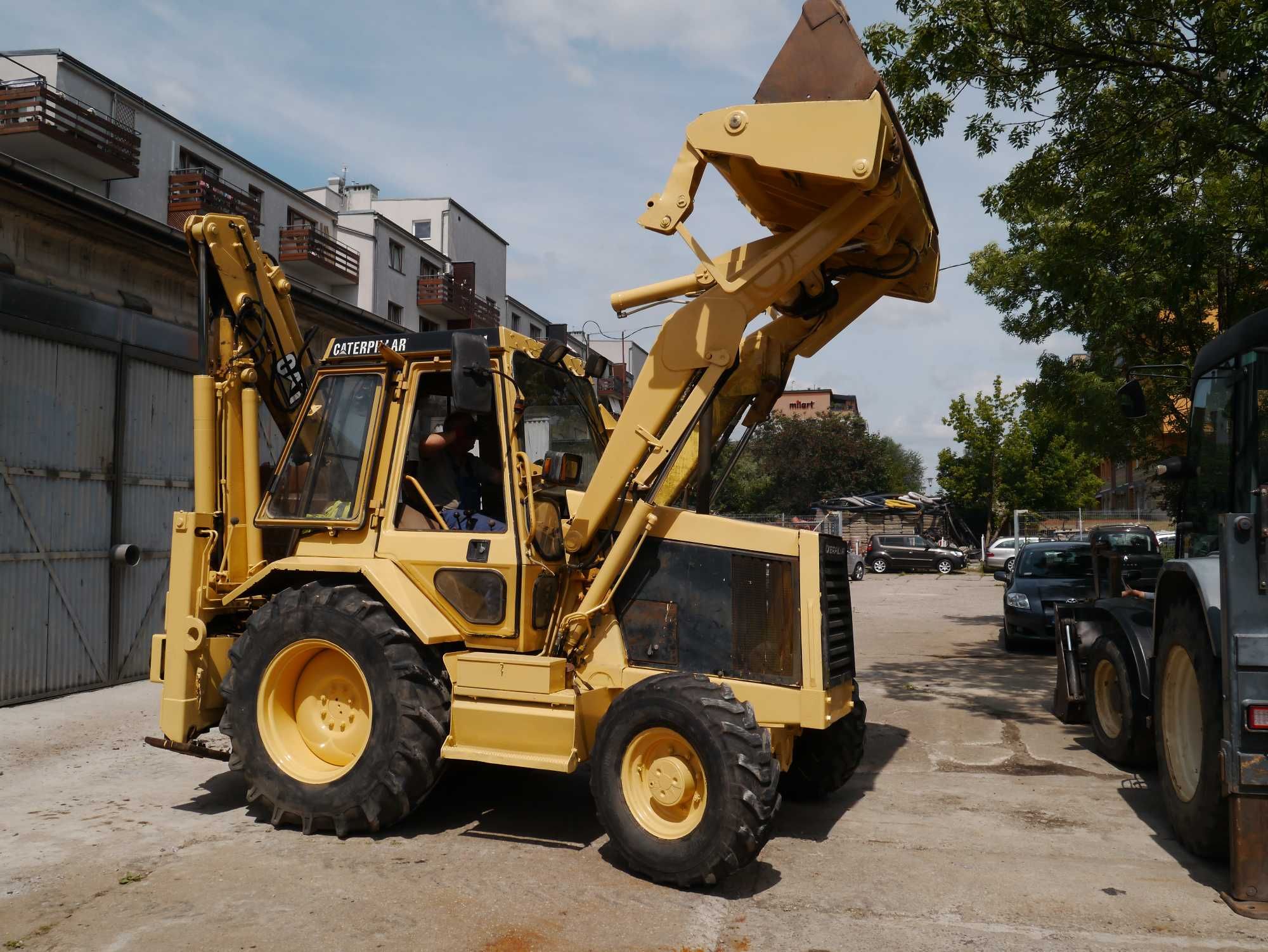 Koparko-ładowarka Caterpillar 428, 1990r