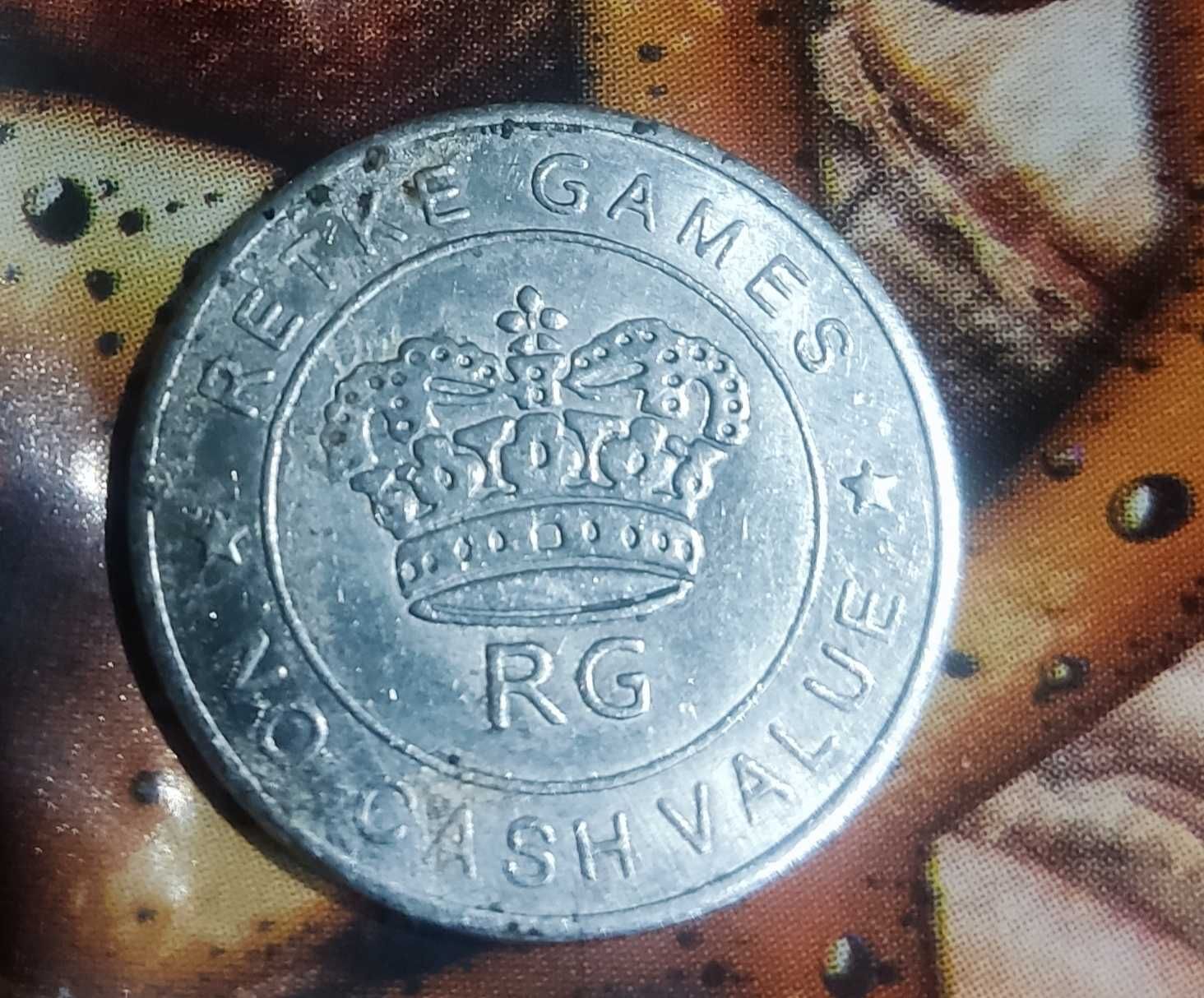 Монета жетон RG.