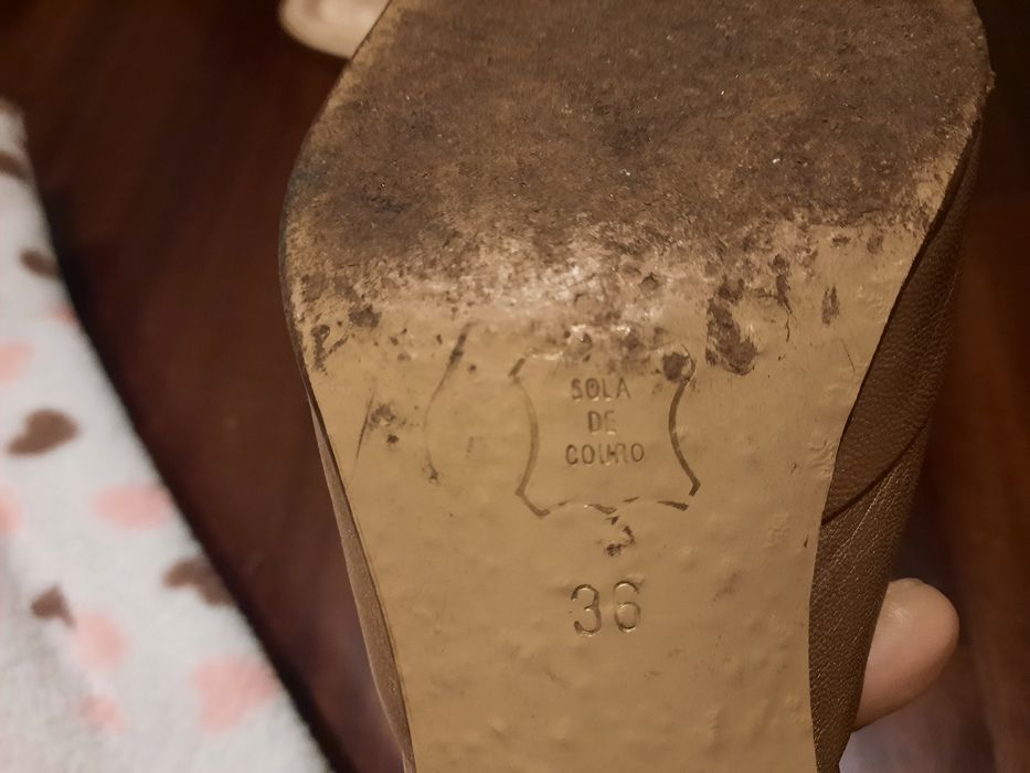 Mules Haity e clutch.