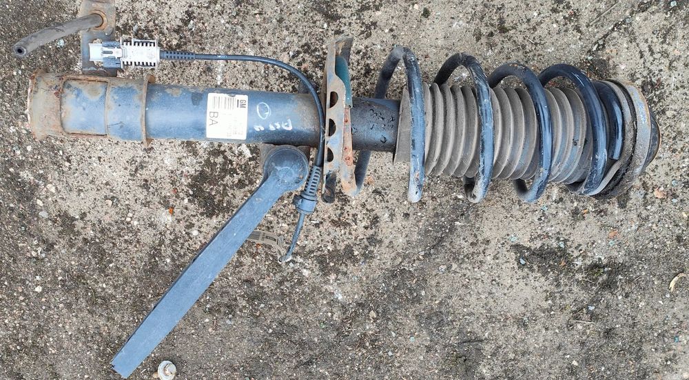 OPEL ASTRA H III 08r AMORTYZATOR SPRĘŻYNA 24466535