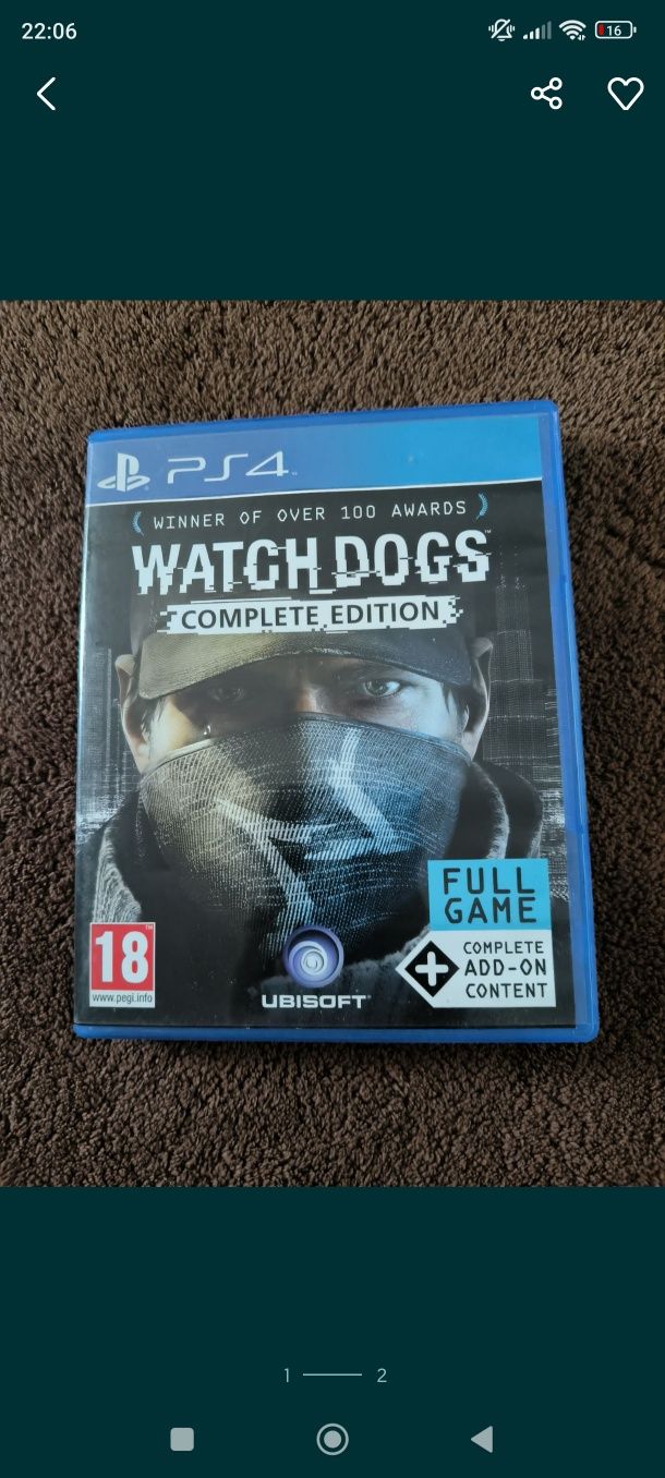 PlayStation 4 (1 terabyte) + 2 comandos + phones + 2 jogos físicos