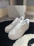 Biały^trwały^NikeAirForce1^UnisexTrampki Roz.38