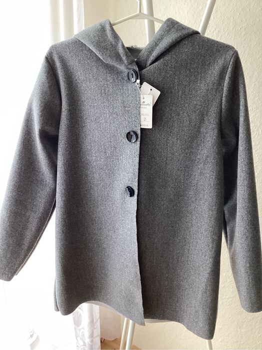 Damski nowy płaszczyk wiosenny.