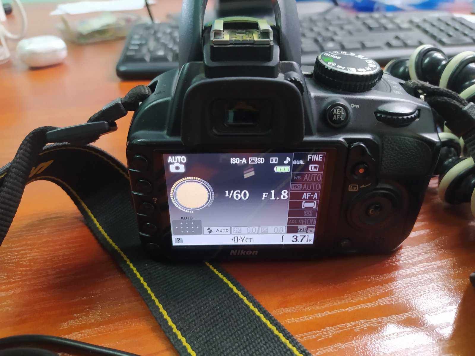 Продам фотоапарат Nikon D3100+обьектив  Nikon AF-S Nikkor35 mm f1.8