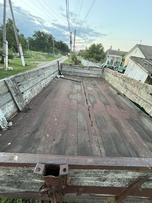 Трактор ЮМЗ 6 з прицепом, культиватором і марком