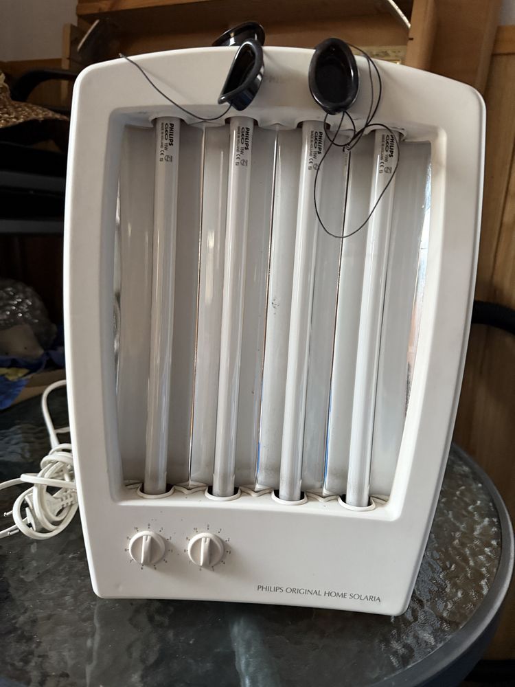 Solarium na twarz i dekold Philips