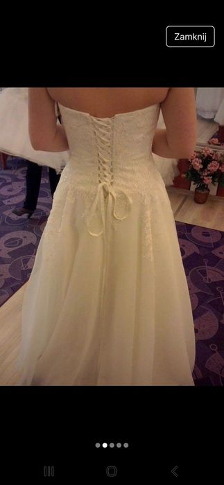 Suknia ślubna z kolekcji Elizabeth Passion, w kolorze ivory