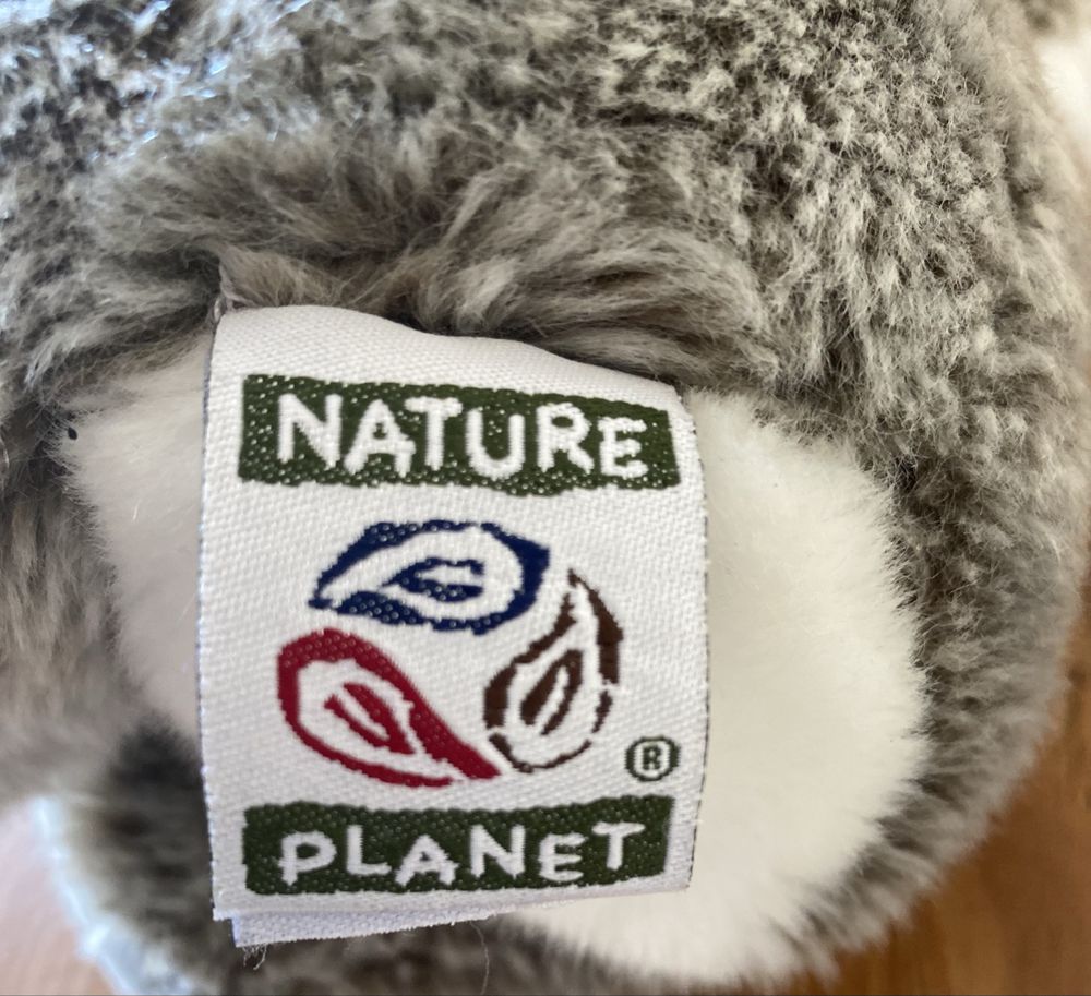 Coala de peluche com bebé em tricot