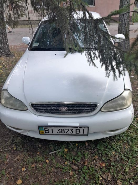 Кіа Кларус 2000 рік 2.0 газ/бензин ціна за двигун частинами