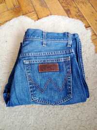 Ciemnoniebieskie jeansy Wrangler