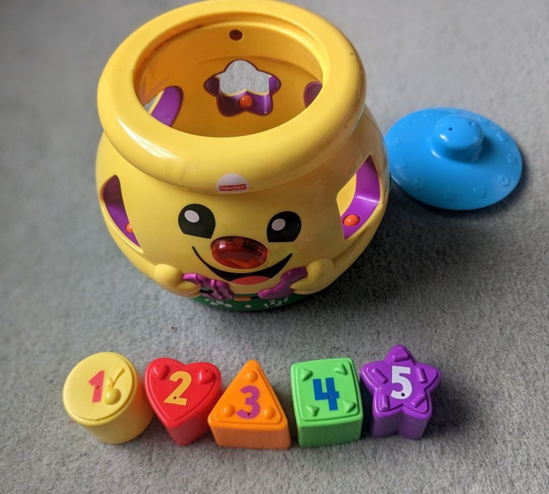 Garnuszek na klocuszek Fisher Price śpiewa po angielsku