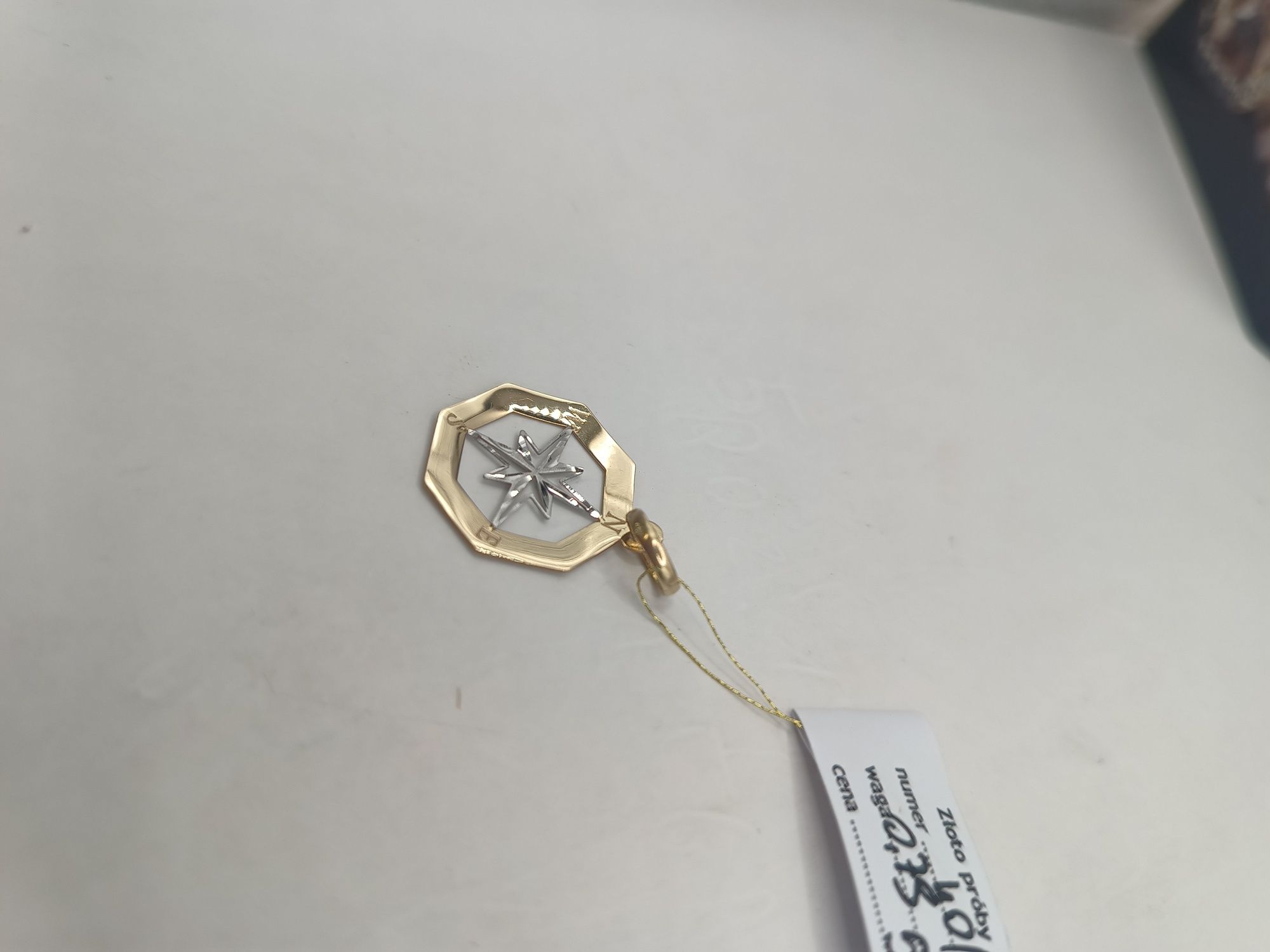 Złota zawieszka gwiazda północy  żółto białe złoto pr 585 14 karat