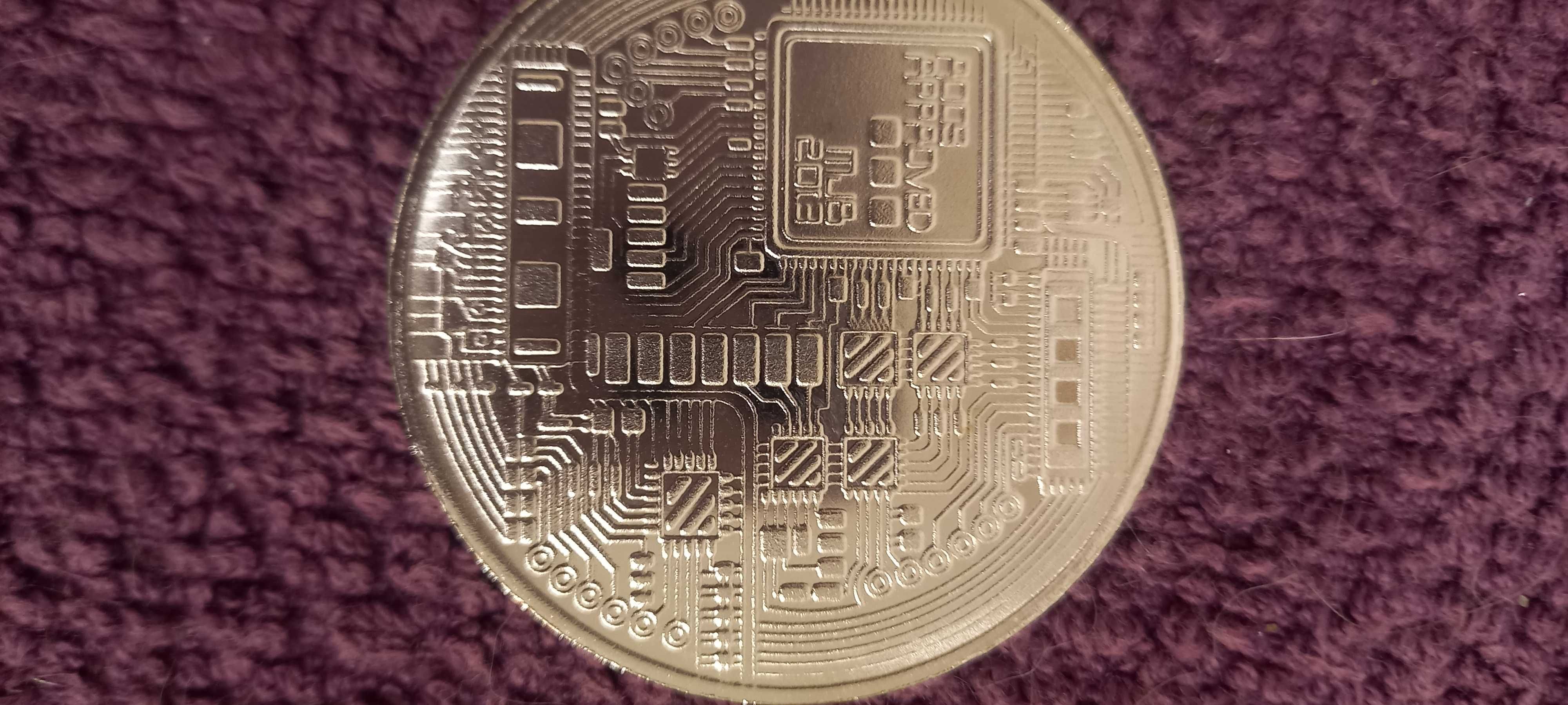 Монета  биткоин.