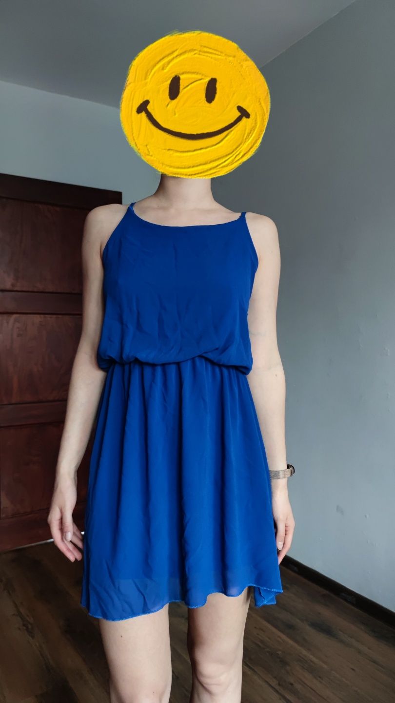 Niebieska sukienka asymetryczna