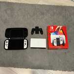 Nintendo Switch OLED 64 GB + Etui Stan idealny