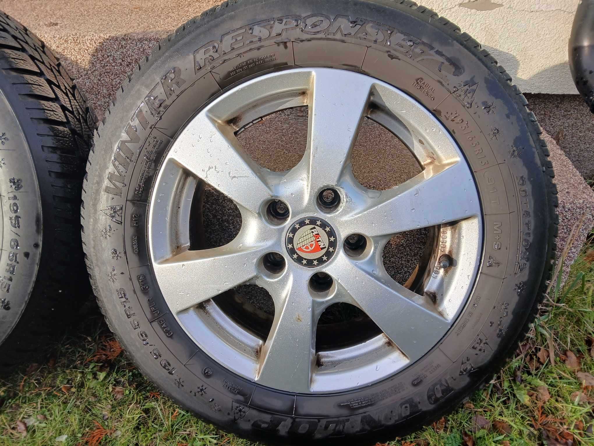 Alufelgi koła zimowe Opel Astra Zafira 5x110 Opony Dunlop