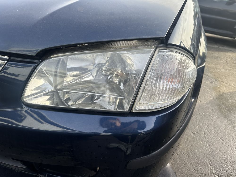 Otica e pisca direito /esquerdo mazda  323 F ano 2000